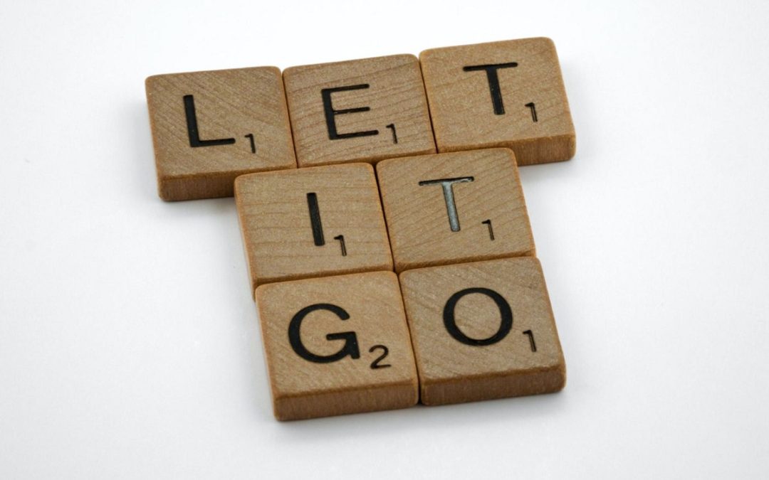 Scrabble tiles spelling out Let It Go